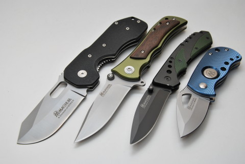 четыре модели ножей Магнум оф Бёкер